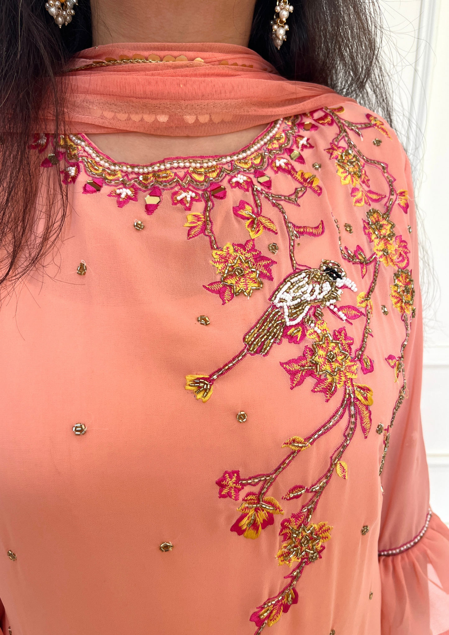 Georgette based Bird Daali Hand Embroidered 3pc suit in Peach Colour